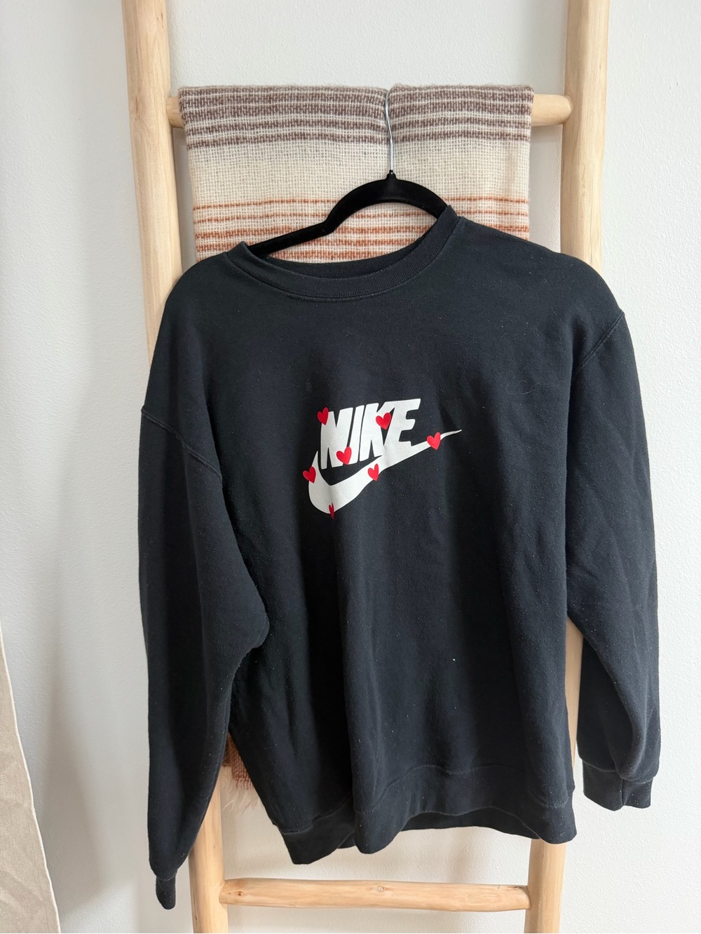 Nike Black Sweatshirt with White Logo and Red Heart Accents